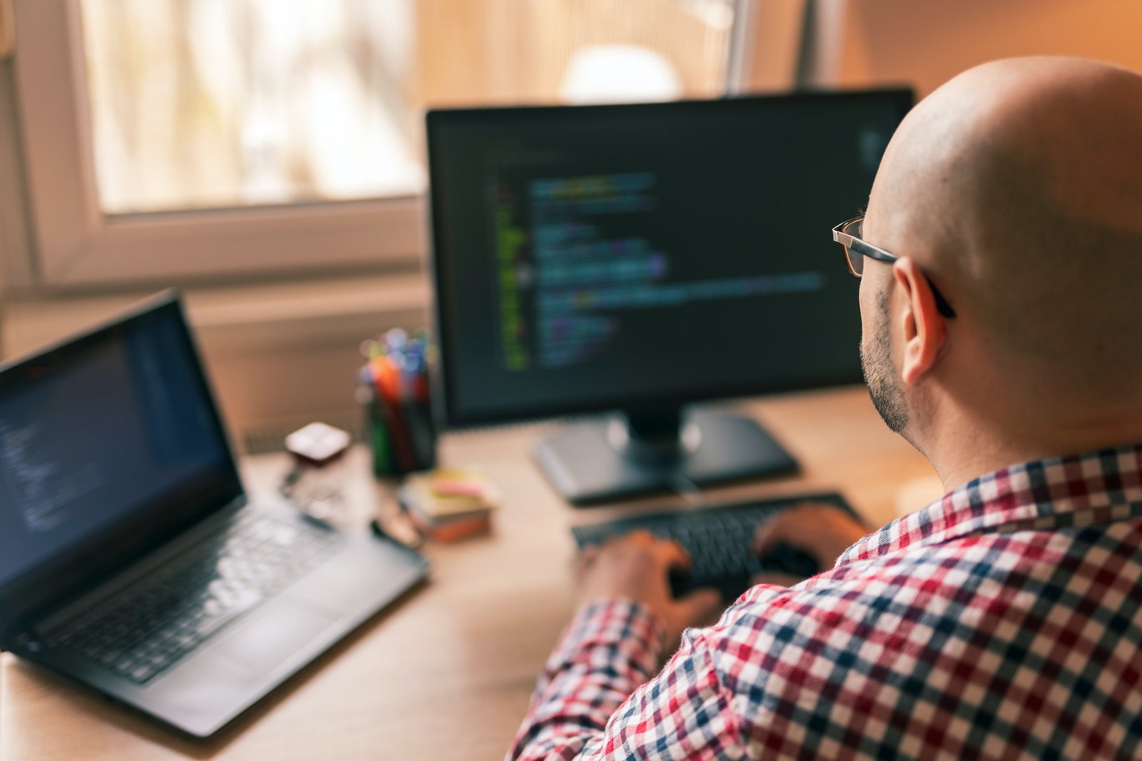 male-programmer-working-in-home-office.jpg male-programmer-working-in-home-office.jpg
